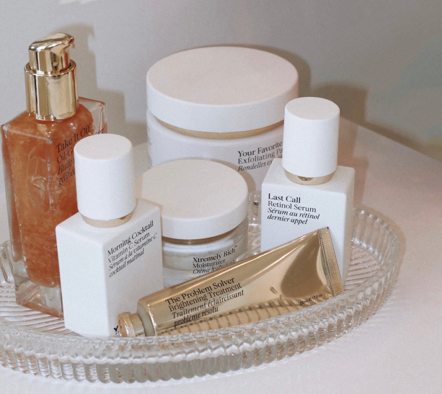 YISE Beauty skincare lineup styled on a vanity tray