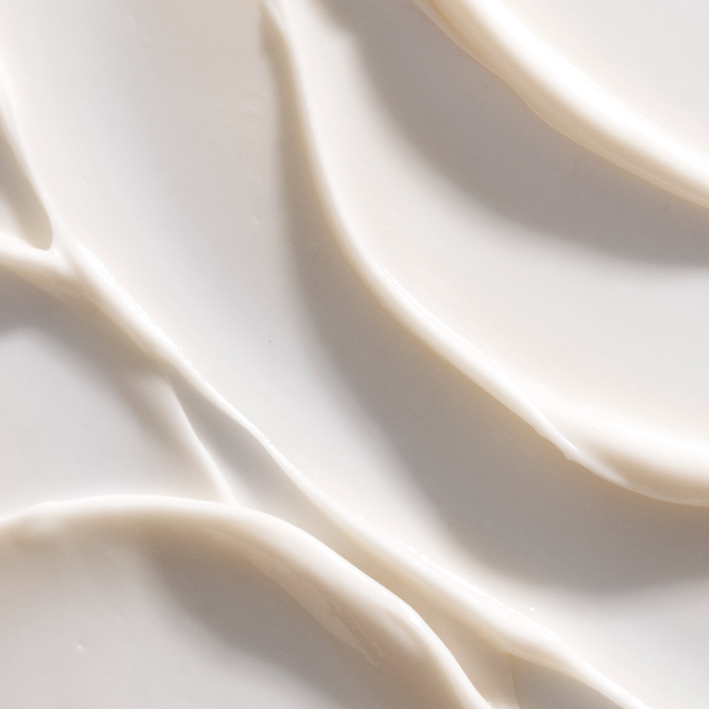 Close-up of Xtremely Rich Moisturizer's thick, swirled cream texture.
