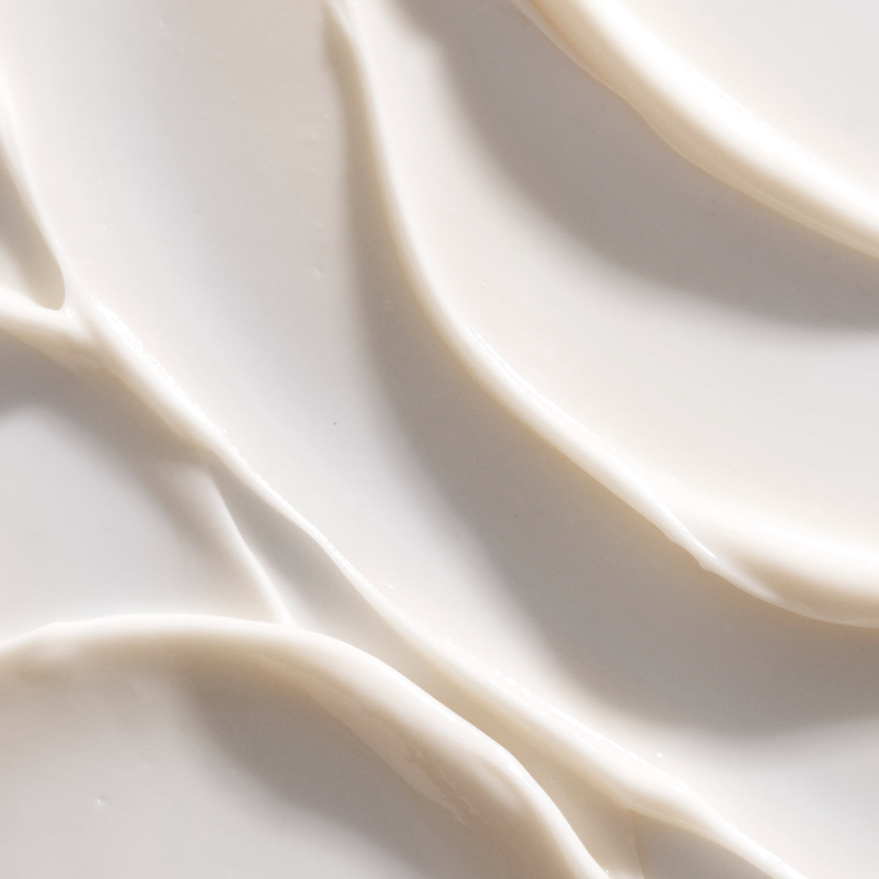 Close-up of Xtremely Rich Moisturizer's thick, swirled cream texture.