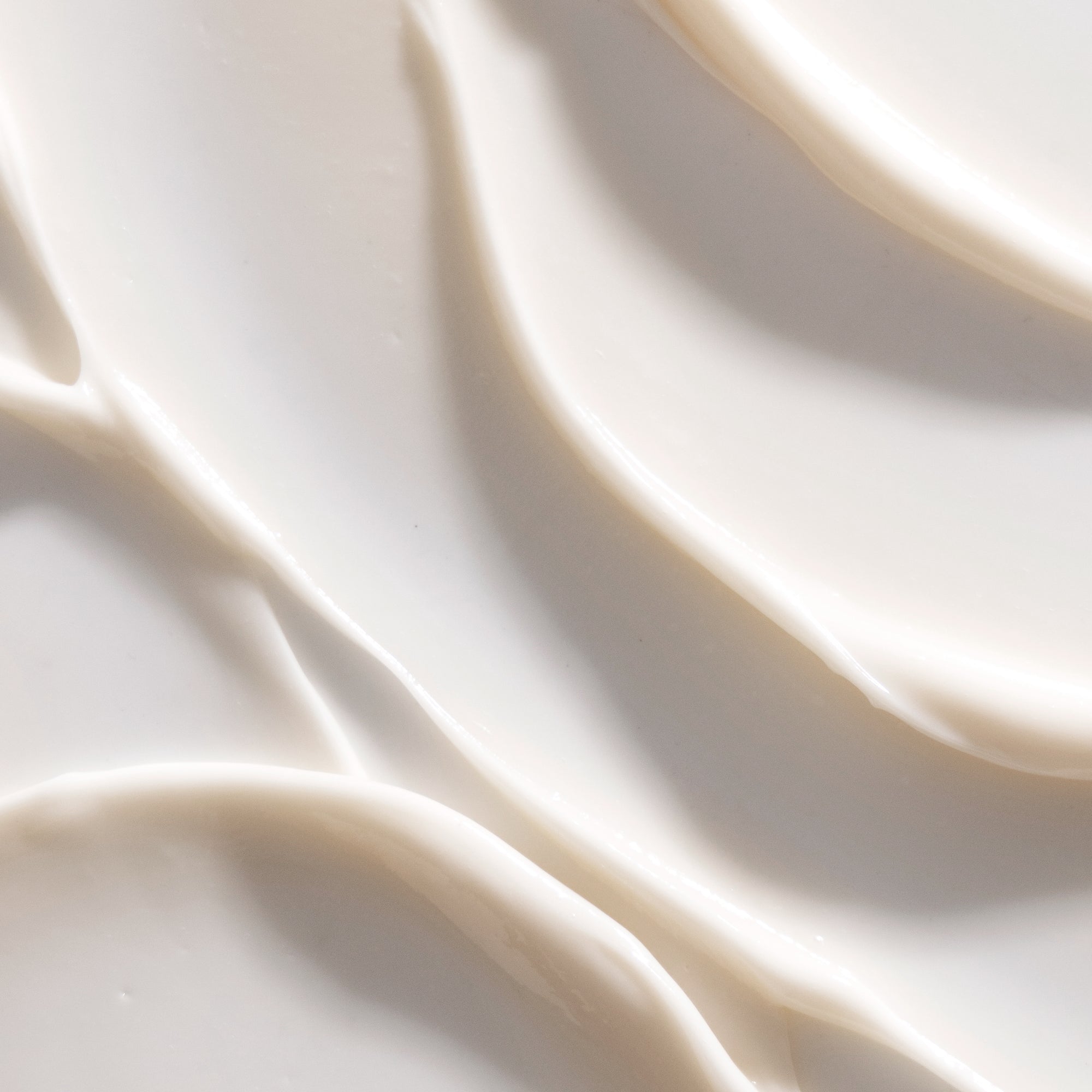 Close-up of Xtremely Rich Moisturizer's thick, swirled cream texture.