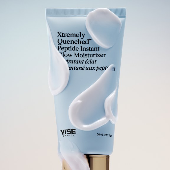 The Xtremely Quenched moisturizer tube with a swipe of product across it.